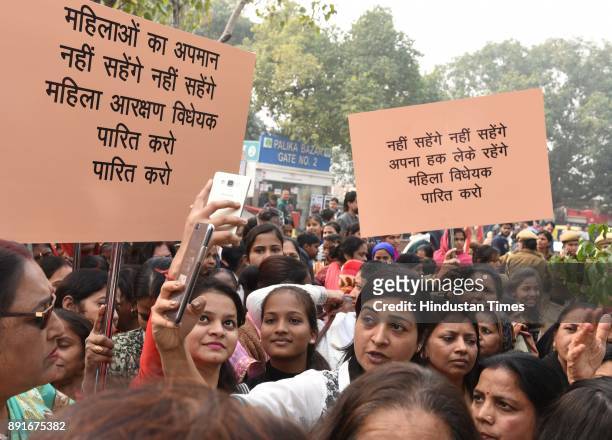 Leader Alka Lamba is seen during a demonstration on the Urgent Need to Pass Women's Reservation Bill in Winter Session of Parliament at Connaught...