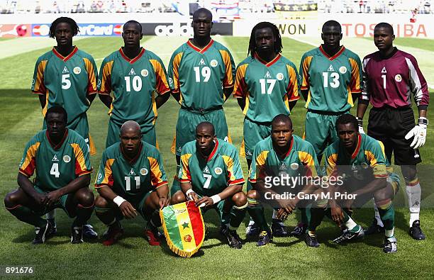 The Senegal team pose for a team group before the first half of the Uruguay v Senegal Group A, World Cup Group Stage match played at the Suwon World...
