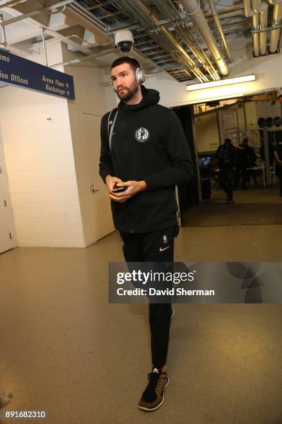 Jeff Withey of the Dallas Mavericks arrives at the arena before the game against the Minnesota Timberwolves on December 10, 2017 at Target Center in...