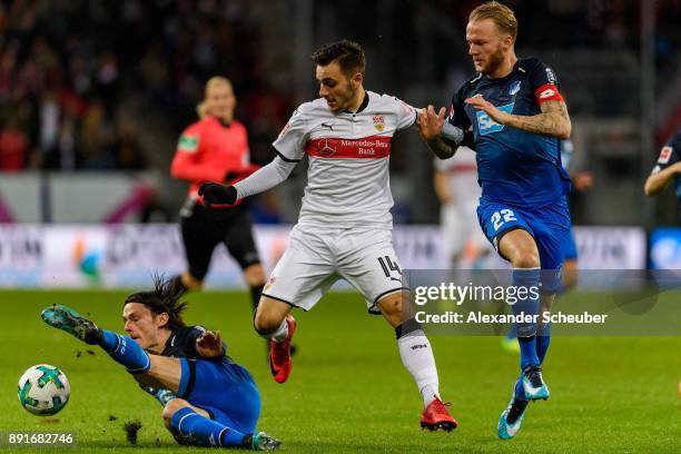 Head coach Nico Schulz of Hoffenheim and Kevin Vogt of Hoffenheim in action against Anastasios Donis of Stuttgart during the Bundesliga match between...