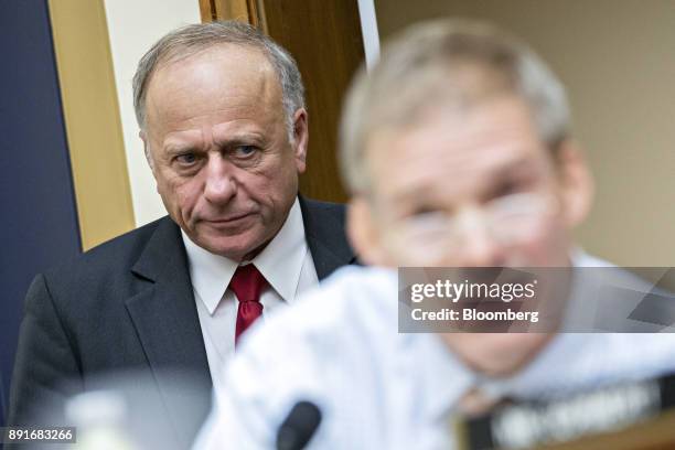 Representative Steve King, a Republican from Iowa, listens as Representative Jim Jordan, a Republican from Ohio, right, questions Rod Rosenstein,...