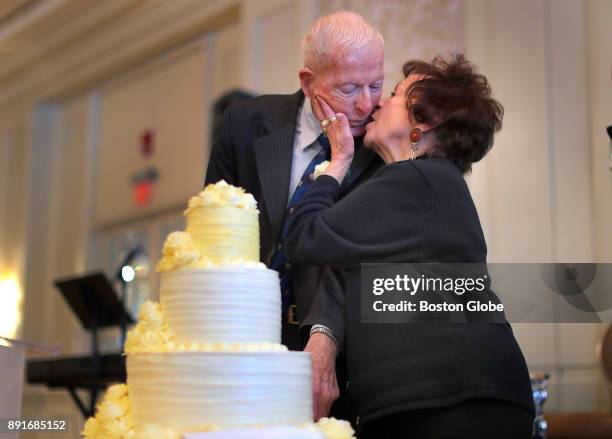Rose and Frank Murphy, who have been married for 66 years, kiss after cutting the ceremonial anniversary cake during the annual Boston Elderly...