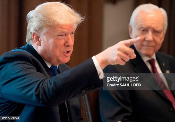 President Donald Trump speaks about tax reform legislation during a lunch with lawmakers working on the tax reform conference committee, including...