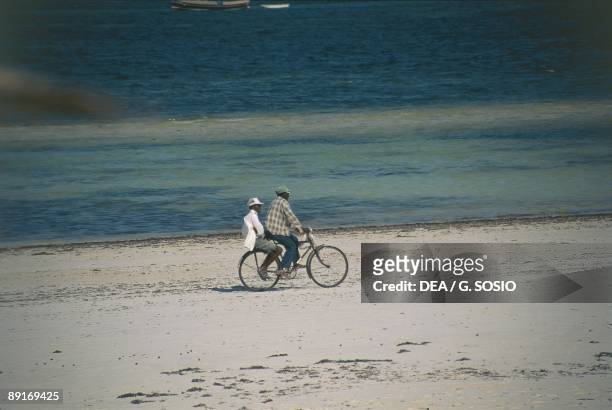 Kenya - Malindi. Bikers on beach