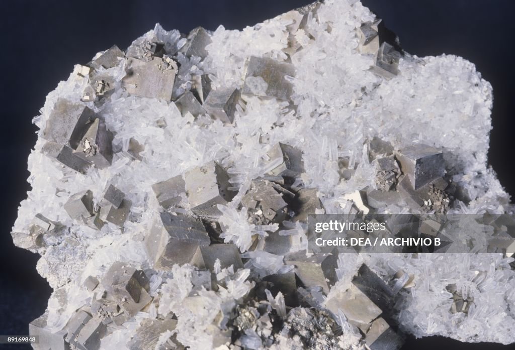 Cubes pyrite crystals and Quartz, close-up