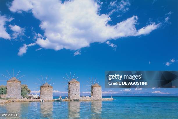 Traditional windmills along the sea, Chios, Aegean Sea, Aegean Islands, Northern Aegean, Greece