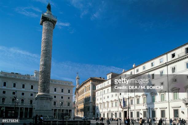 Low angle view of a column in front of a palace, Column Of Marcus Aurelius, Palazzo Chigi, Piazza Colonna, Rome, Lazio, Italy