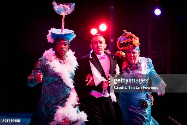 Kat B as Victiqua, Stephane Anelli as Dandini and Tony White as Queeniqua during a performance of Cinderella at Hackney Empire on December 13, 2017...