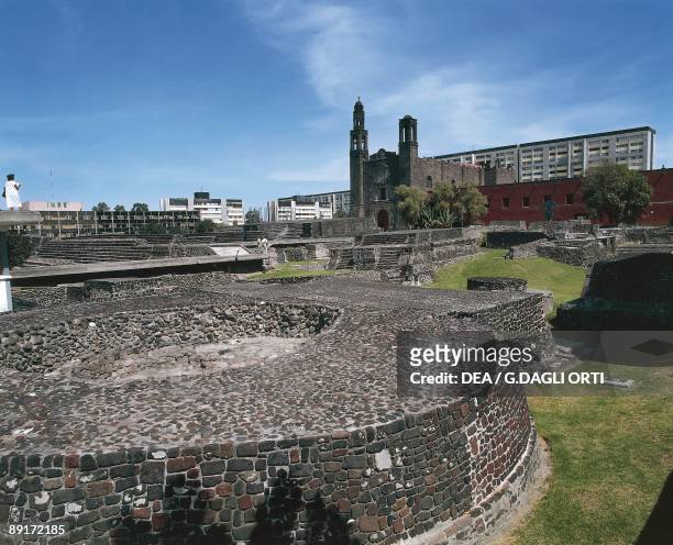 Old ruins of buildings, Aztec Temple Of Tlatelolco And Church Of Santiago, Plaza Of Three Culturas, Mexico City, Mexico