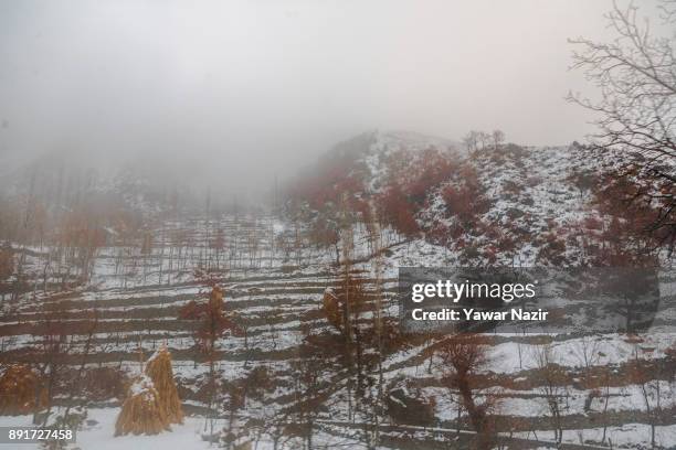 View of snow clad mountains after seasons first snowfall on December 13, 2017In the outskirts of Srinagar, the summer capital of Indian administered...