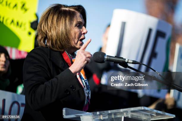 House Minority Leader Nancy Pelosi speaks during a rally against the Republican tax plan on December 13, 2017 in Washington, DC.