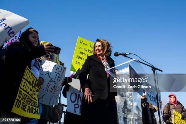 House Minority Leader Nancy Pelosi speaks during a rally against the Republican tax plan on December 13, 2017 in Washington, DC.