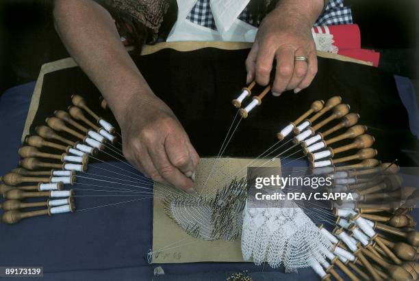 Woman's hand making lace, Bruges, Flanders, Belgium