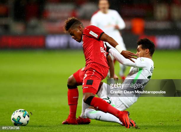 Leon Patrick Bailey of Leverkusen and Theodor Gebre Selassie of Bremen battle for the ball during the Bundesliga match between Bayer 04 Leverkusen...