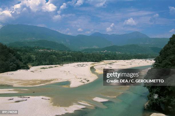 High angle view of a river with mountains in the background, Tagliamento River, Spilimbergo, Friuli Venezia Giulia, Italy
