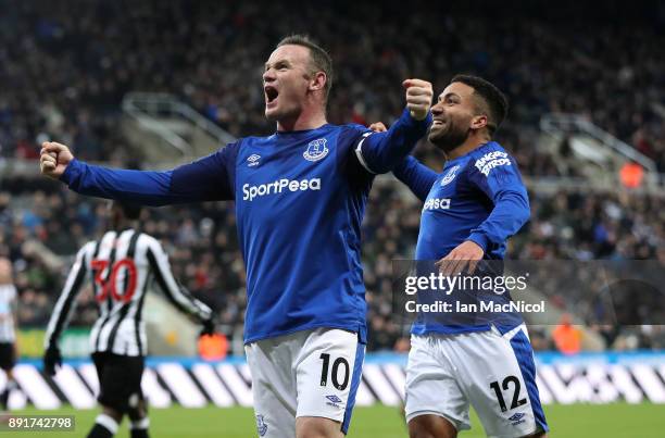 Wayne Rooney of Everton celebrates after scoring his sides first goal with Aaron Lennon of Everton during the Premier League match between Newcastle...