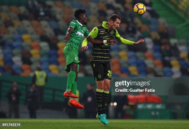 Sporting CP midfielder Radosav Petrovic from Serbia with Vilaverdense FC midfielder Ahmed Isaiah in action during the Portuguese Cup match between...