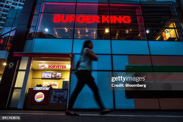 Pedestrian passes in front of a Burger King do Brasil restaurant on Paulista Avenue in Sao Paulo, Brazil, on Monday, Dec. 11, 2017. Burger King do...