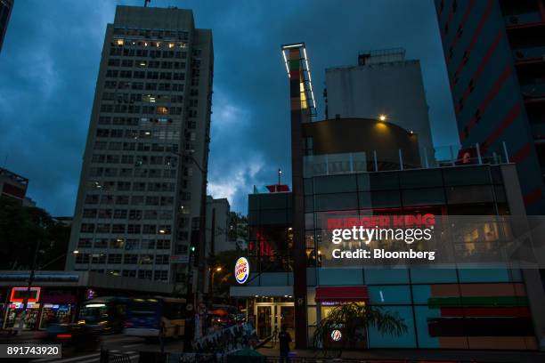 Burger King do Brasil restaurant stands illuminated at night on Paulista Avenue in Sao Paulo, Brazil, on Monday, Dec. 11, 2017. Burger King do Brasil...