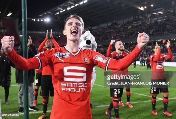 Rennes' French midfielder Benjamin Bourigeaud celebrates with teammates after Stade Rennais qualified following the French League Cup round of 16...