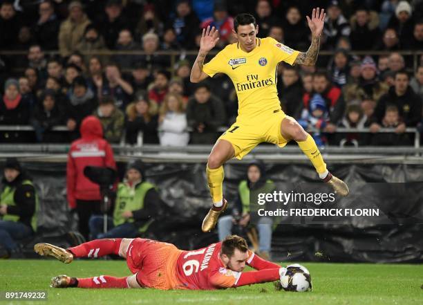 Paris Saint-Germain's Argentinian forward Angel Di Maria vies with Strasbourg's French goalkeeper Alexandre Oukidja during the French League Cup...