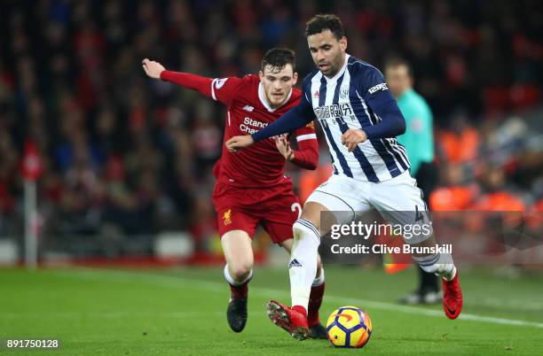 Hal Robson-Kanu of West Bromwich Albion is challenged by Andy Robertson of Liverpool during the Premier League match between Liverpool and West...