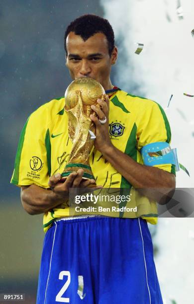 Cafu of Brazil kisses the trophy after the Germany v Brazil, World Cup Final match played at the International Stadium Yokohama in Yokohama, Japan on...