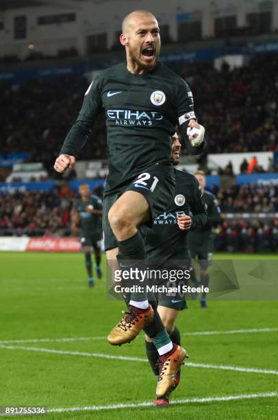 David Silva of Manchester City celebrates after scoring his sides third goal during the Premier League match between Swansea City and Manchester City...