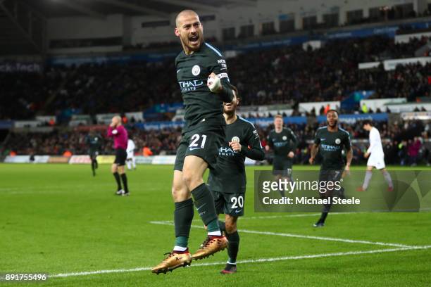 David Silva of Manchester City celebrates after scoring his sides third goal during the Premier League match between Swansea City and Manchester City...