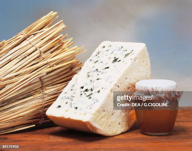 Close-up of cheese with dried sticks