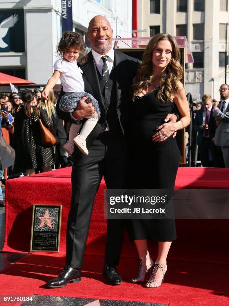 Dwayne Johnson, Lauren Hashian and daughter Jasmine Johnson attend a ceremony honoring him with a star on The Hollywood Walk of Fame on December 13,...