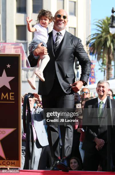 Dwayne Johnson and daughter Jasmine Johnson attends a ceremony honoring him with a star on The Hollywood Walk of Fame on December 13, 2017 in Los...