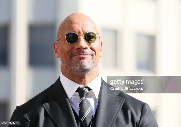 Dwayne Johnson is honored with a star on The Hollywood Walk of Fame on December 13, 2017 in Los Angeles, California.