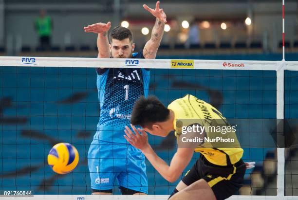 Matthew Anderson , Chen Zhang , during FIVB Volleyball Men's World Club Championship match between Russia's Zenit Kazan and China's...