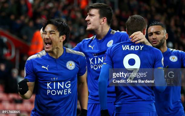 Shinji Okazaki of Leicester City celebrates after scoring his sides fourth goal with his Leicester City team mates during the Premier League match...