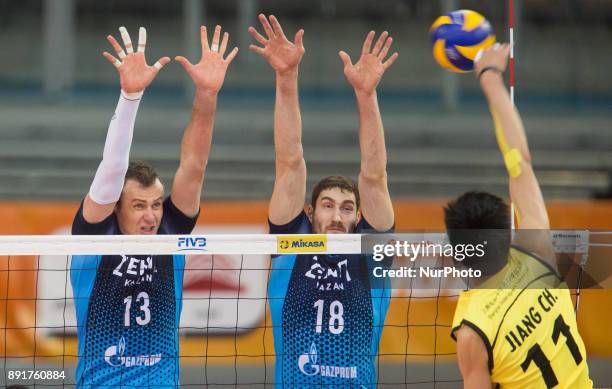 Alexey Samoylenko , Maxim Mikhaylov , Chuan Jiang , during FIVB Volleyball Men's World Club Championship match between Russia's Zenit Kazan and...