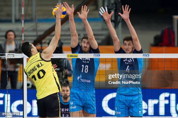 Weijun Zhong , Maxim Mikhaylov , Artem Volvich , during FIVB Volleyball Men's World Club Championship match between Russia's Zenit Kazan and China's...