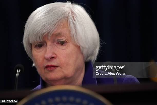 Federal Reserve Chair Janet Yellen pauses during a news conference December 13, 2017 in Washington, DC. Yellen announced that the Federal Reserve is...