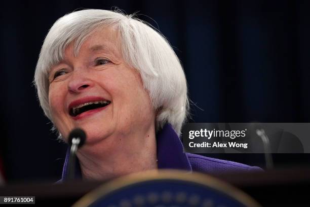 Federal Reserve Chair Janet Yellen laughes during a news conference December 13, 2017 in Washington, DC. Yellen announced that the Federal Reserve is...