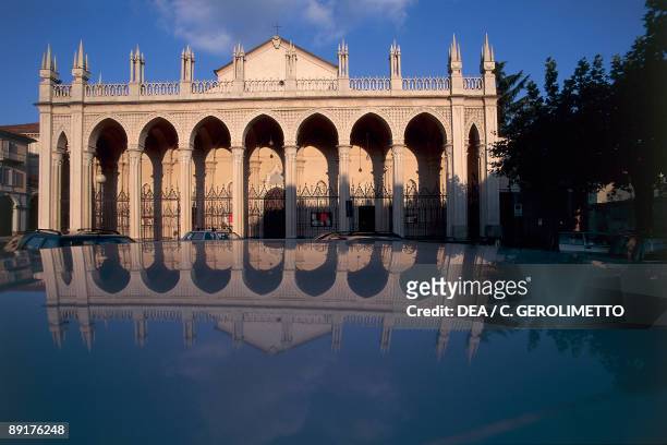 Reflection of a cathedral in water, Biella, Piedmont, Italy