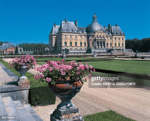 Formal garden in front of a castle, Chateau de Vaux le Vicomte, Maincy, Seine-et-Marne, Ile-de-France, France