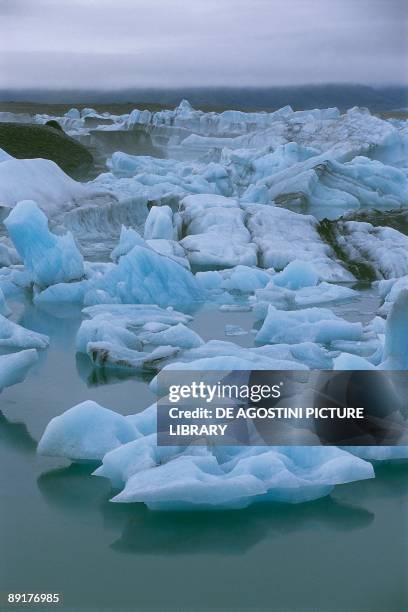 Icebergs in a lagoon, Jokulsarlon Lagoon, Breidamerkurjokull Glacier, Austurland, Iceland
