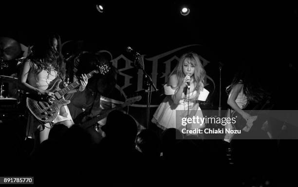 Mi-ya, Asami and Midori of Lovebites perform live on stage at Underworld on November 27, 2017 in London, England.