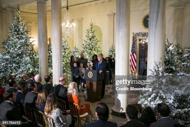 President Donald Trump delivers remarks about tax reform in the Grand Foyer of the White House in Washington, D.C., U.S., on Wednesday, Dec. 13,...