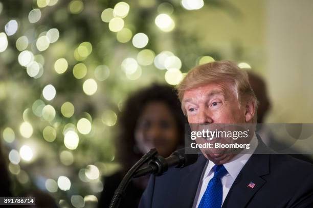 President Donald Trump delivers remarks about tax reform in the Grand Foyer of the White House in Washington, D.C., U.S., on Wednesday, Dec. 13,...