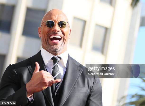 Dwayne Johnson is honored with a star on The Hollywood Walk of Fame on December 13, 2017 in Los Angeles, California.