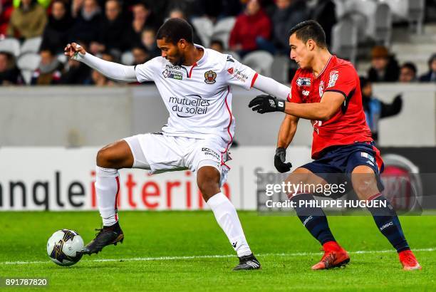 Nice's French defender Marlon Santos vies with Lille's Dutch-Morrocan forward Anwar El-Ghazi during the French League Cup round of 16 football match...