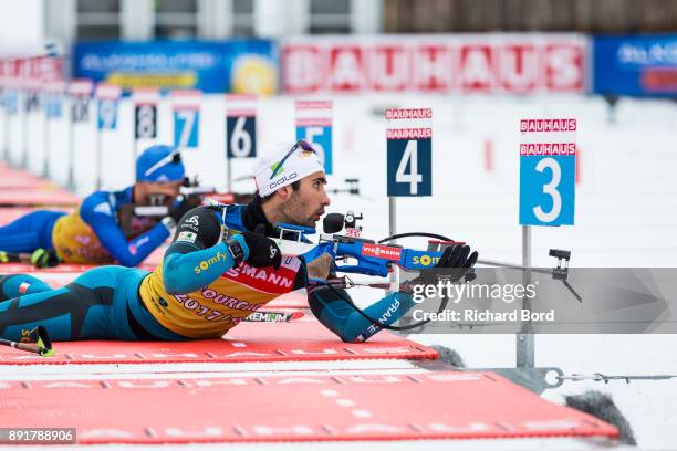 Martin Fourcade of France shoots during the second day of training during the IBU Biathlon World Cup on December 13, 2017 in Le Grand Bornand, France.