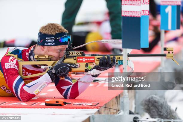 Johannes Thingnes Boe of Norway shoots during the second day of training during the IBU Biathlon World Cup on December 13, 2017 in Le Grand Bornand,...