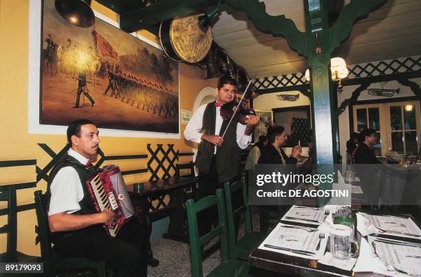 Musical band performing in a restaurant, Grinzing, Vienna, Austria